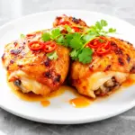 baked honey sriracha chicken thighs - featured image