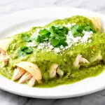creamy green chile chicken enchiladas - featured image