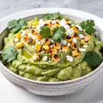 loaded guacamole with roasted corn - featured image